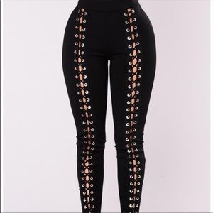 Fashion nova X’s & O’s lace up pants.